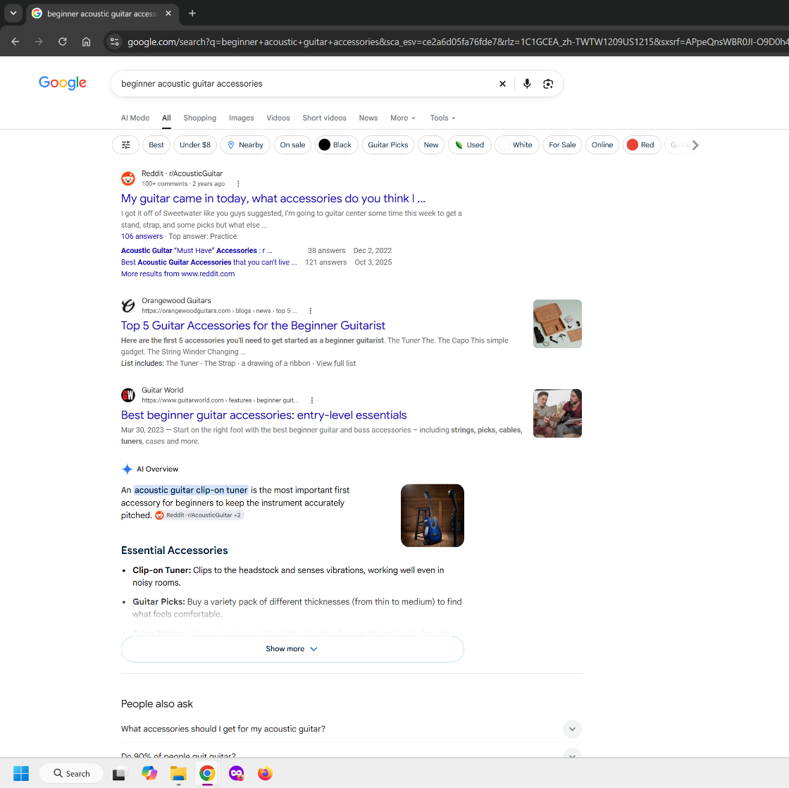 Google search results for beginner acoustic guitar accessories showing Reddit, Guitar World and accessory recommendations.